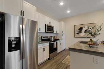 Full kitchen with stainless steel appliances